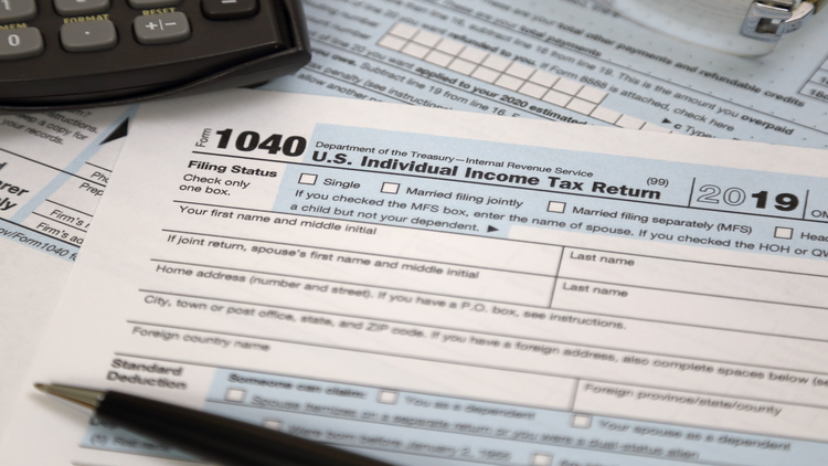 A 2019 U.S. Individual Income Tax Return form, IRS Form 1040, with various fields for tax filing information.