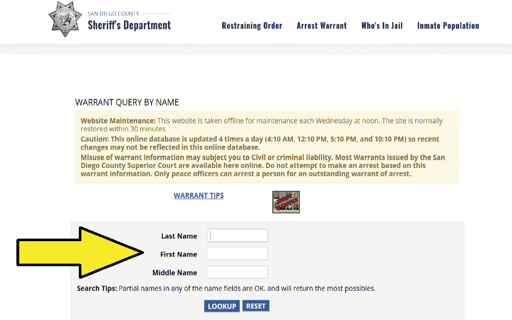 Screenshot of the San Diego Sheriff's Department California warrant search page, with yellow arrow. 