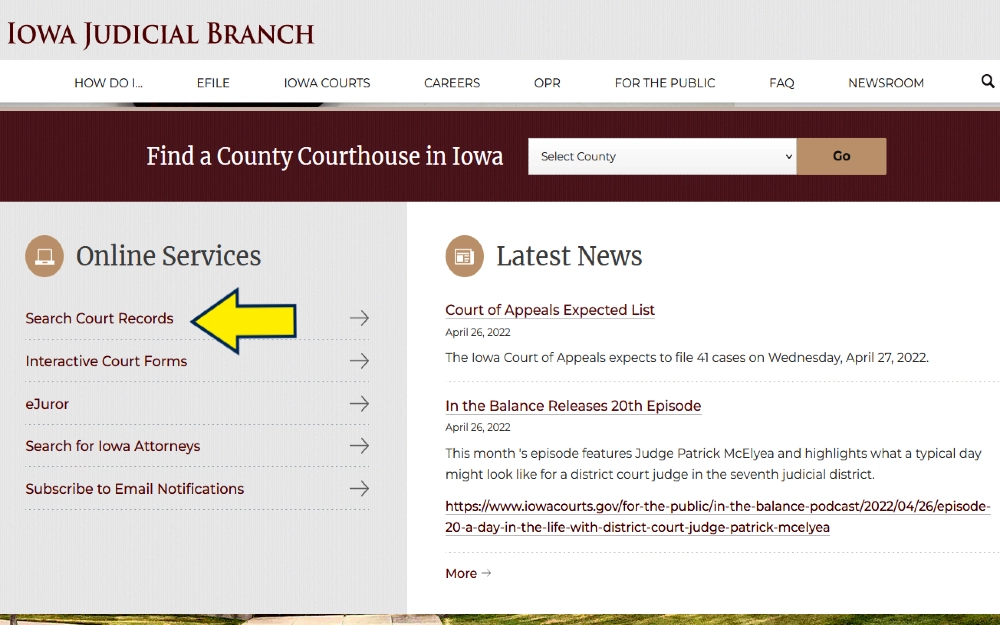 Iowa Judicial Brach website screenshot with a yellow arrow pointing to the link for searching court records in Iowa, which can be used in an Iowa criminal background check. 