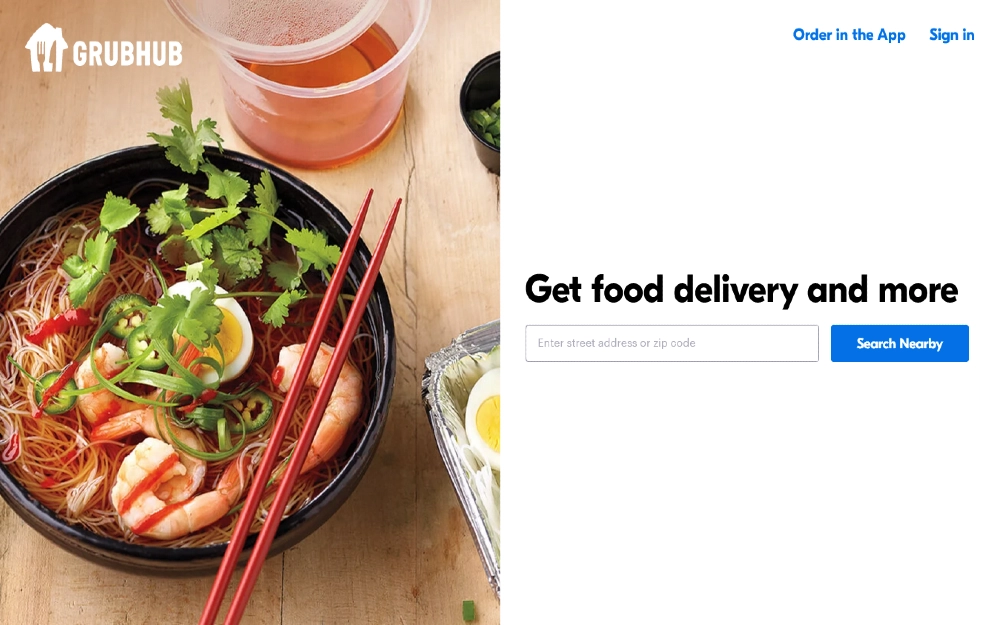 Grubhub website screenshot showing shrimp and noodles and cilantro with chopsticks resting on the side of the bowl on the left and the search bar on the right. 