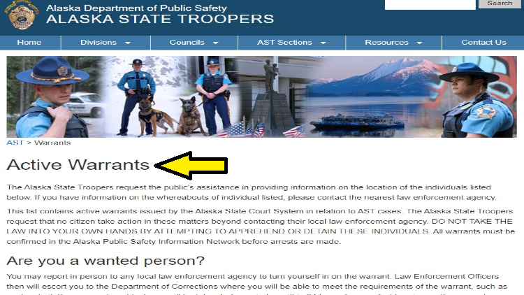 Screenshot of Alaska Department of Public Safety website page for warrants with yellow arrow on list of active warrants in Alaska State Troopers records.
