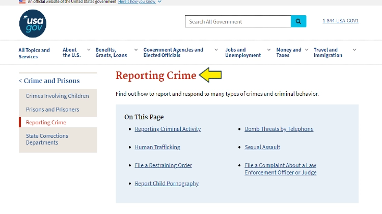 Screenshot of USA Government website page for crime and prisons with yellow arrow pointing to references for reporting crime.