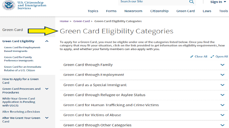 Screenshot of U.S. Department of Homeland Security for USCIS with yellow arrow on green card eligibility categories.