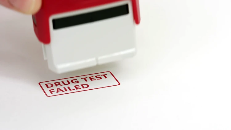 red ink stamp that says drug test failed