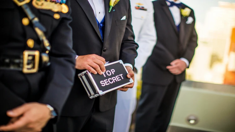 Close up image of a top secret box being held