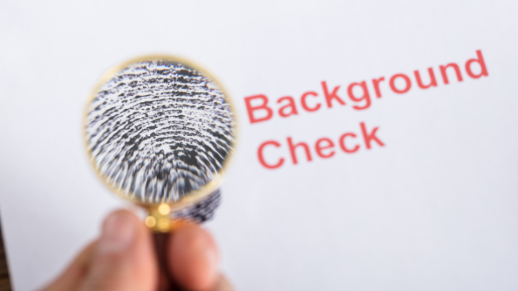 Fingerprint on a white paper for a criminal background check.